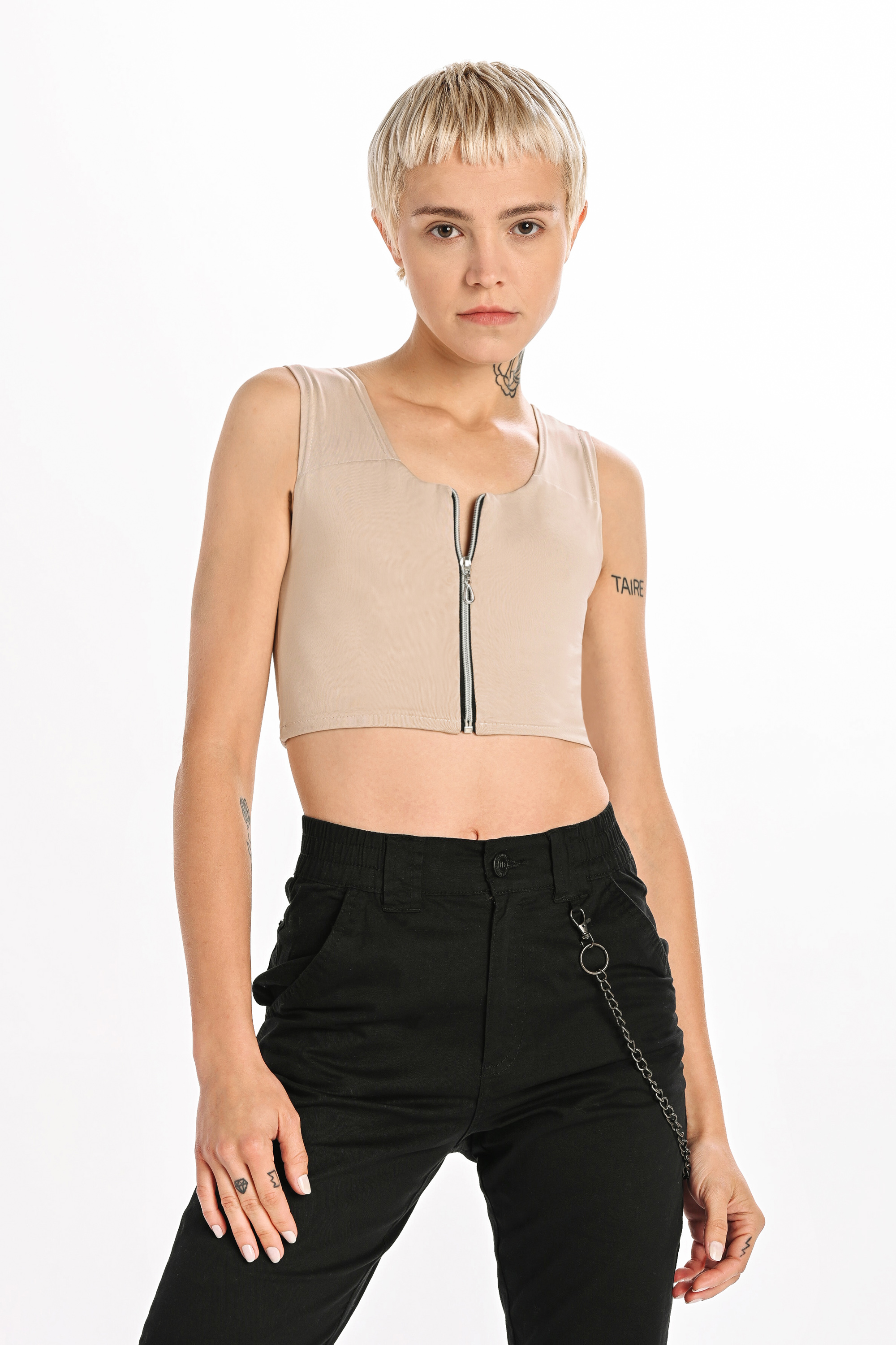 Short, beige, chest binder with a zipper